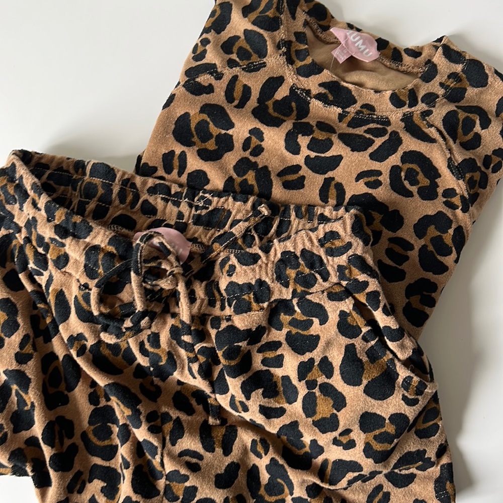 Show Me Your Mumu two-piece leopard sweatshirt and shorts.